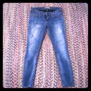 Free people blue jeans with a little white wash.